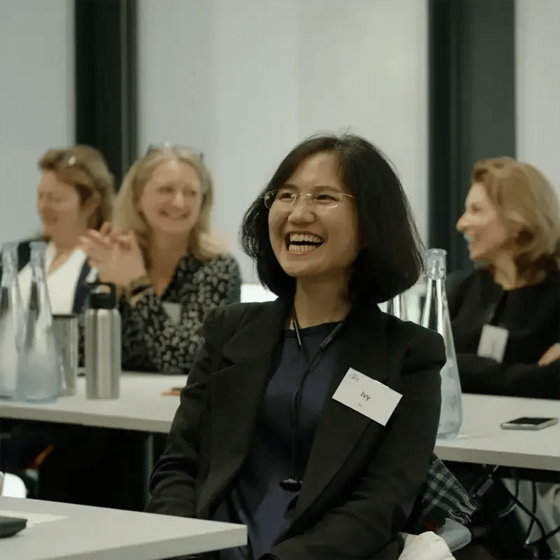 CEDR-Training-Audience-with-very-happy-female-delegate-in-focus