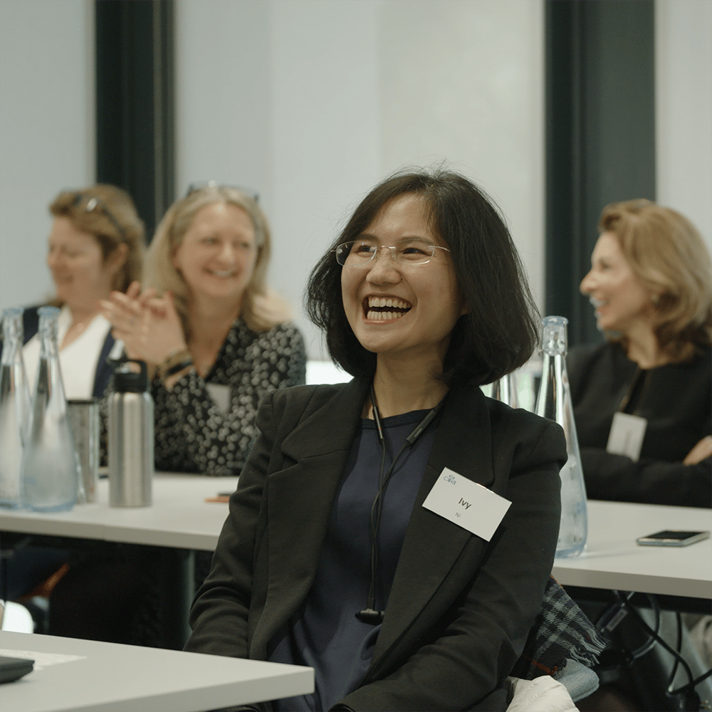 CEDR-Training-Audience-with-very-happy-female-delegate-in-focus
