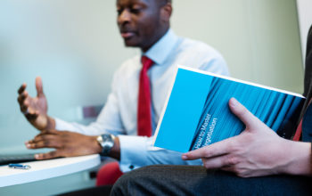 Book in hands and man speaking