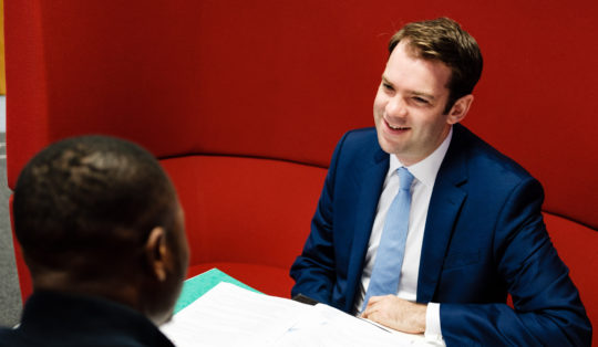 Two CEDR employees in an informal meeting