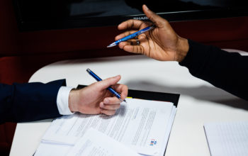 Gesticulating hands in a meeting